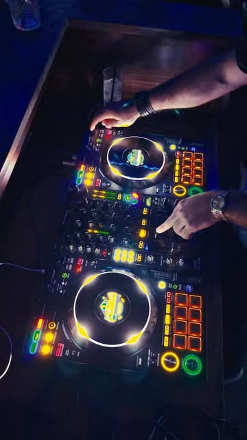 Overhead view of a lit DJ controller